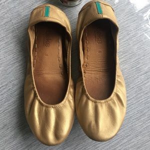 Metallic gold Tieks size 8 with polish